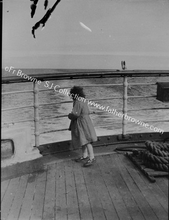 LITTLE GIRL LOOKS BACK AT WALES FROM STERN OF SS SCOTIA